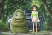 Chihiro a la entrada de parque temático